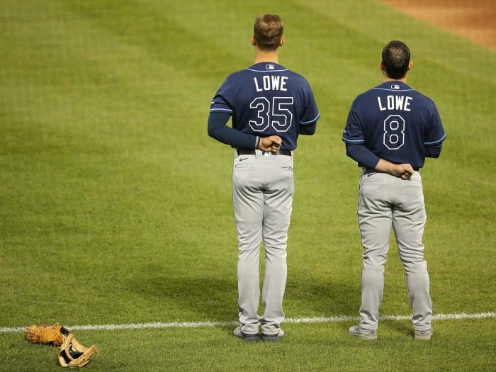 Nate Lowe stands next to Brandon Lowe